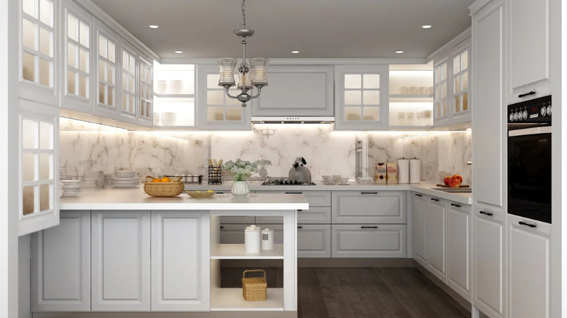 White traditional kitchen design with panelled shutters and an island